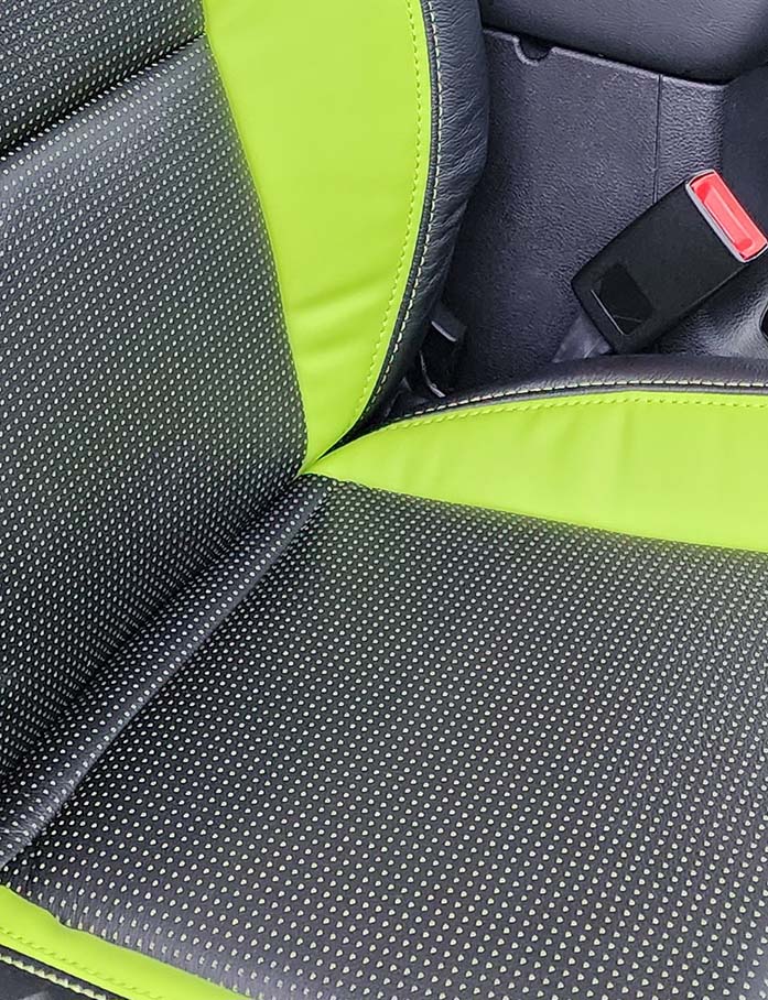 Close up of Barracuda perforated leather texture and stitching